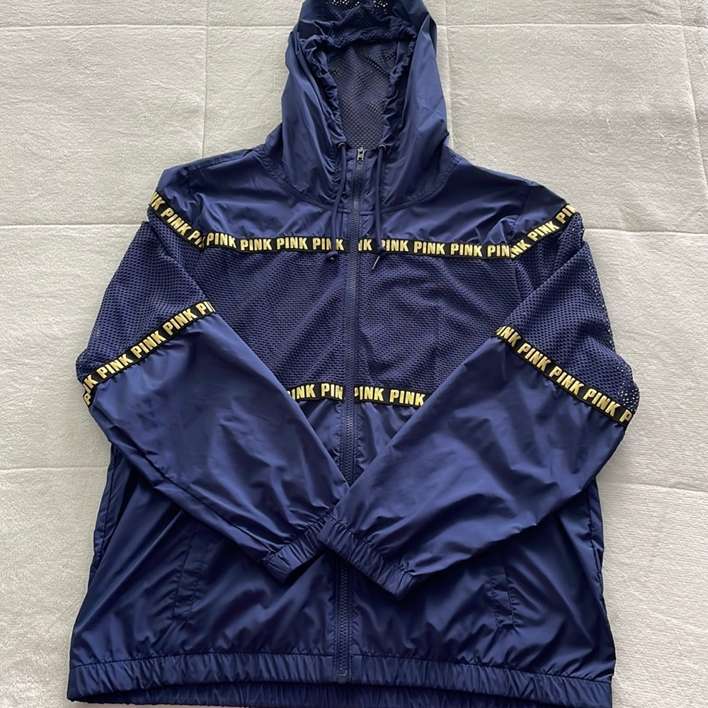 A PINK navy blue windbreaker